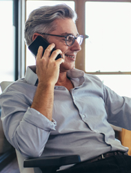 a businessman talking on his mobile device