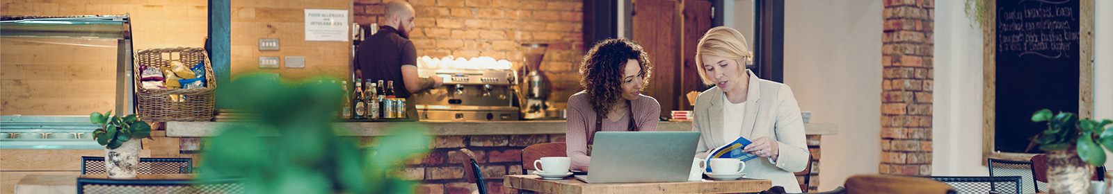 two women discussing savings options