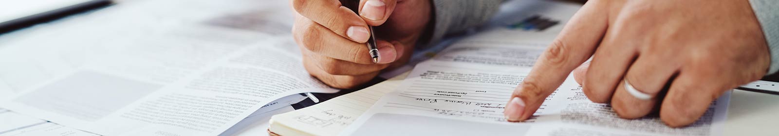 a man reviewing paper documents