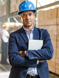 a businessman wearing a hardhat