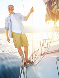 a man riding on the edge of his boat