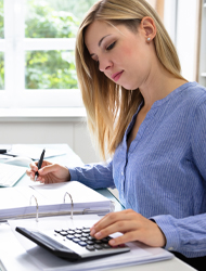 a woman working in her finances